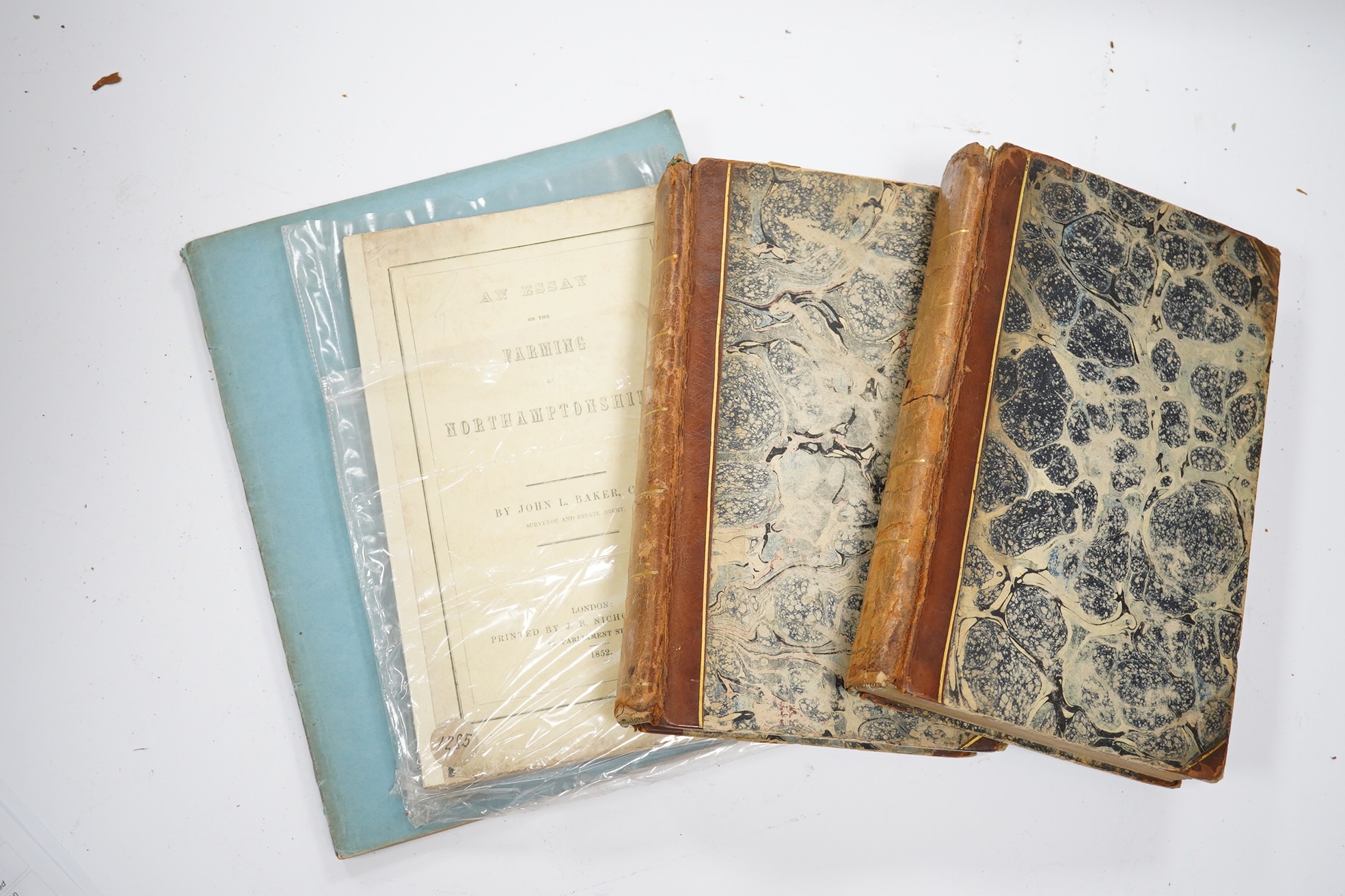 Lowe, Robert - General View of the Agriculture of the County of Nottingham, with Observations on the Means of its Improvement. coloured and folded map; rebound wrappers, 4to. 1794; Baker, John L. - An Essay on the Farmin